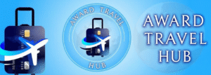 A blue graphic featuring a suitcase with a credit card design and a flying airplane illustration, along with the text AWARD TRAVEL HUB in bold white letters on a blue gradient background.